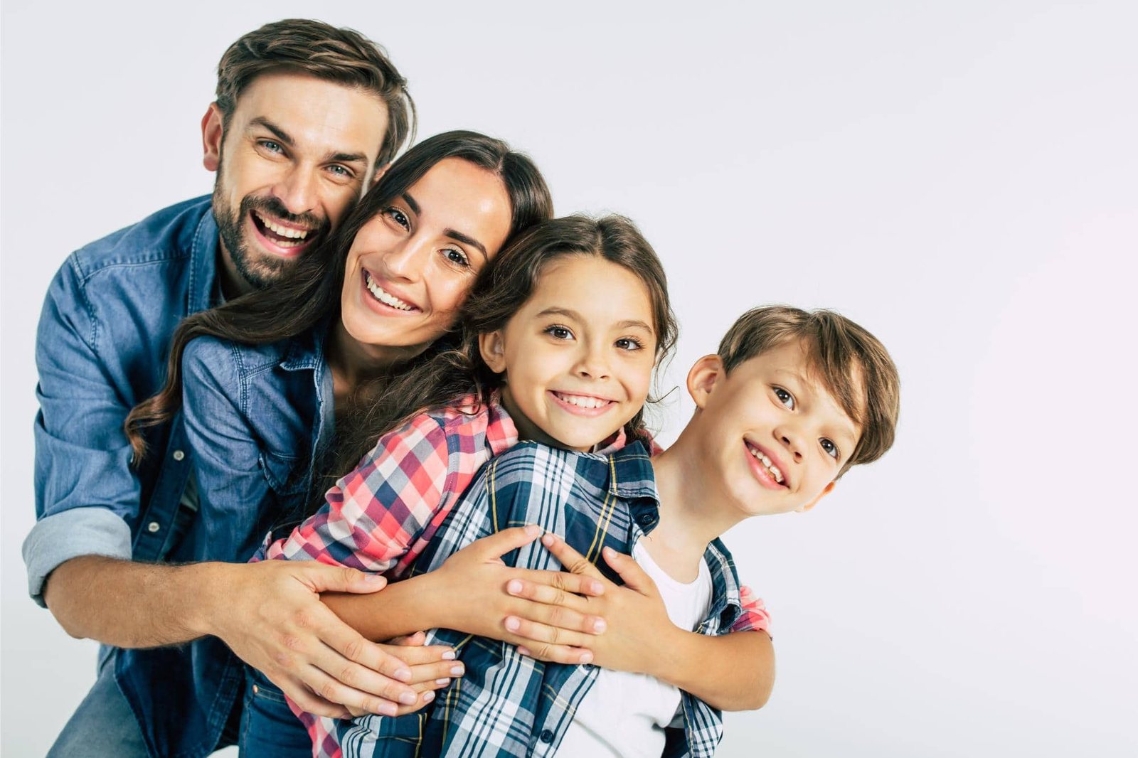 Family of all ages smiling together