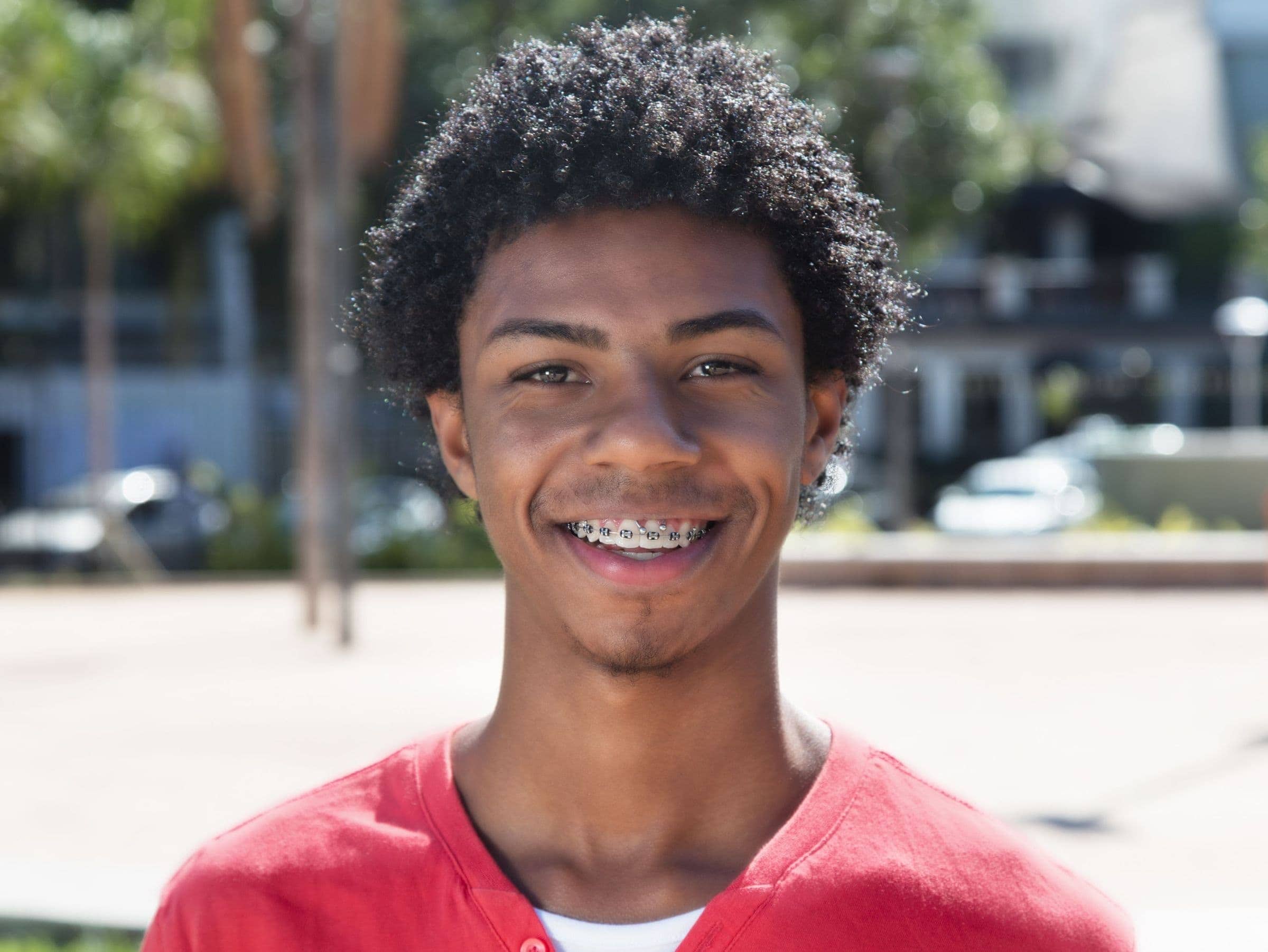 Teen boy smiling with braces