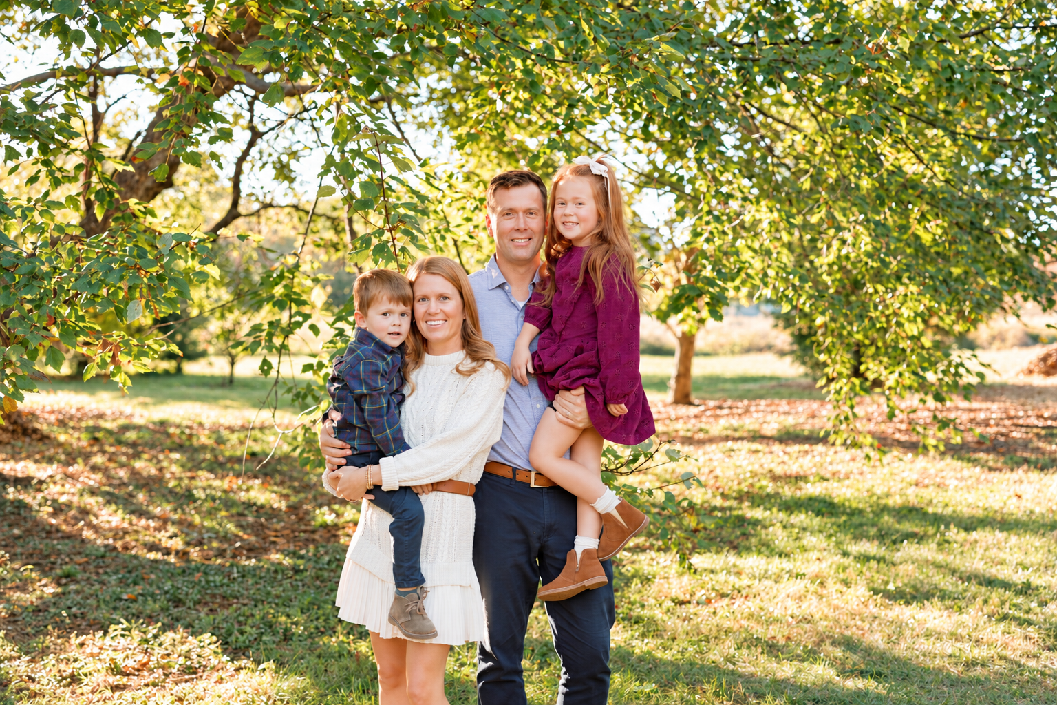 Local Kentucky family smiling outdoors