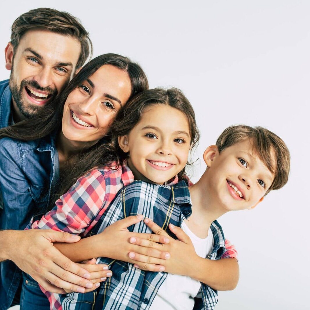 Family of all ages smiling together